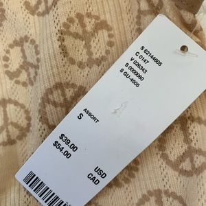 Too big on me or else I’d be keeping never worn brand new